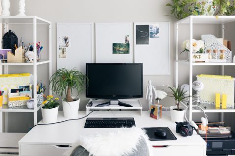 clean chic decorated work space with desktop computer